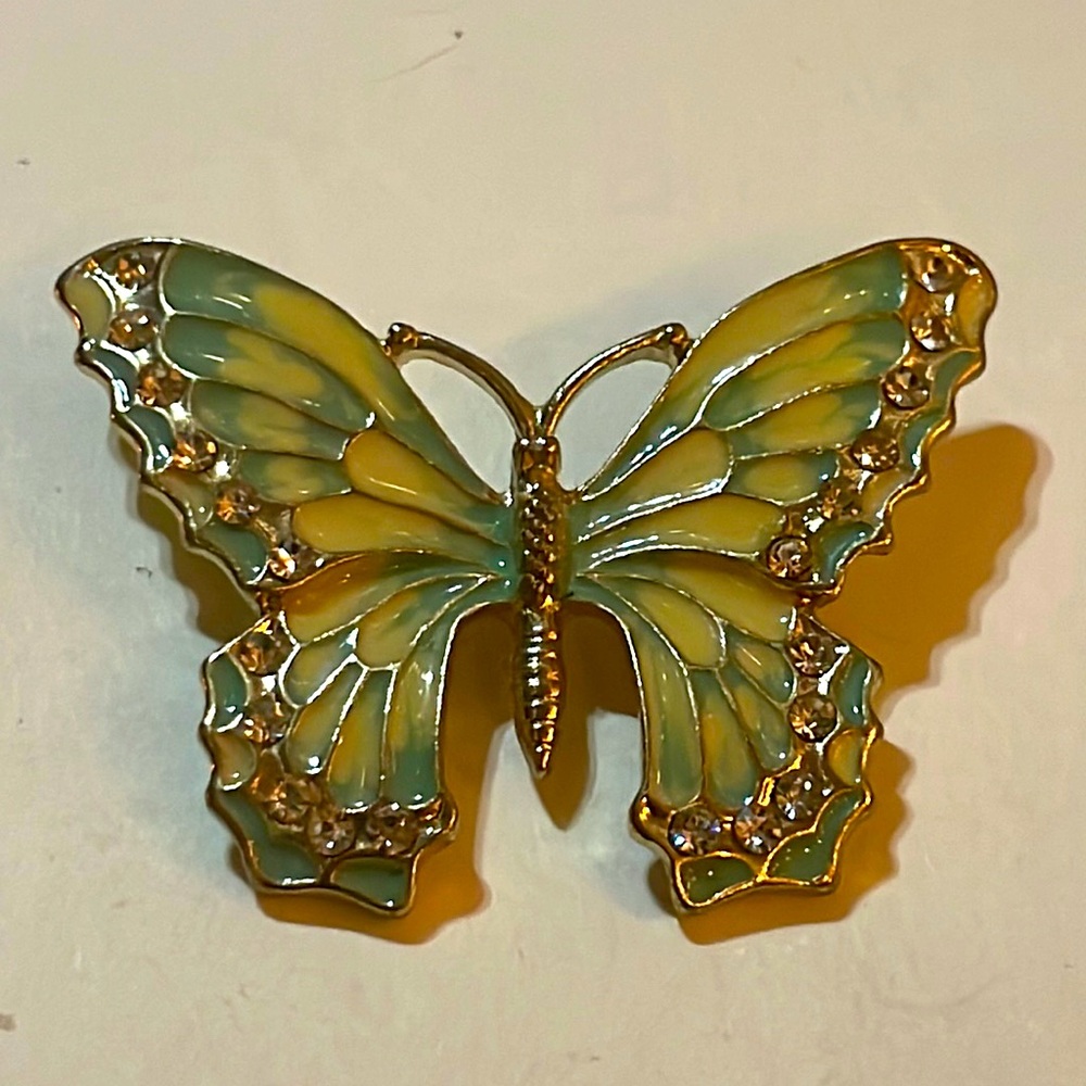 Vintage enamel and rhinestone butterfly. All stones intact ,excellent